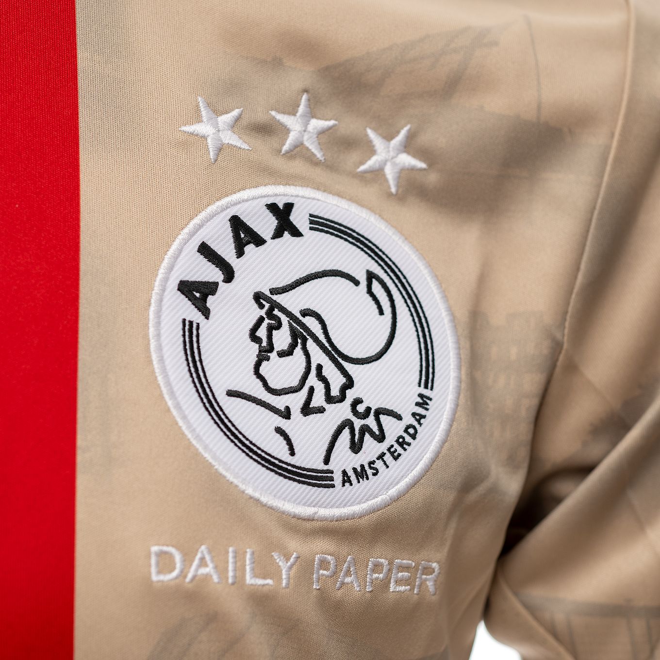 Nouri Ajax Dailypaper Ajax logo.jpg